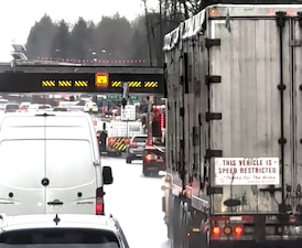 Commercial truck carrying crane strikes overpass in Langley, BCHP investigating