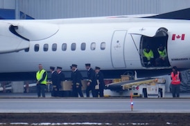 Bodies of pilots who died in collision at N.Y. airport are repatriated to Canada 