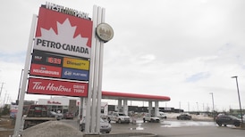 Surging oil prices may help Alberta budget deficit, but gas tax relief not in the works: Horner