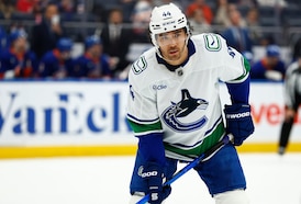 Kiefer Sherwood has hat trick as Canucks beat Islanders 4-1 for 3rd straight win