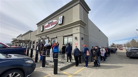 Lineups around the block since night before for local Hockey Card Day giveaways