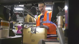 Oilers star visits Amazon sortation facility, helps present donations to charities