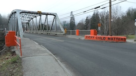 Racist vandalism on B.C. city’s ‘Every Child Matters’ bridge quickly painted over with community’s help 