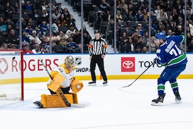 Jake DeBrusk's shootout goal leads Vancouver Canucks past Nashville Predators 4-3