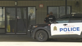 Man hospitalized with life-threatening injuries after assault