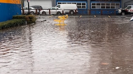 Water main break floods East Vancouver parking lot
