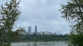 Steady rain relents, but it stays cloudy and cool