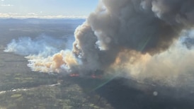 Helicopters battling new ‘highly visible’ wildfire burning out of control in northern B.C.