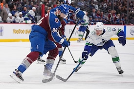 MacKinnon scores twice as the Avalanche beat the Canucks 3-1
