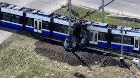 Fiery crash between vehicle, LRT closes several roads near Whitemud Drive