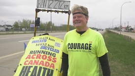 ‘The Fellow in Yellow’ makes Edmonton stop on cross-Canada run back east