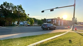 Edmonton police won’t be charged in shooting death of man who pointed gun at shopper