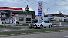 Crash between motorcycle, SUV closes southeast Edmonton road