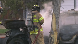 Crash, fire closes lane of 107 Avenue