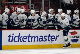 NHL-worst Canucks beat Blackhawks 6-3 to end seven-game skid